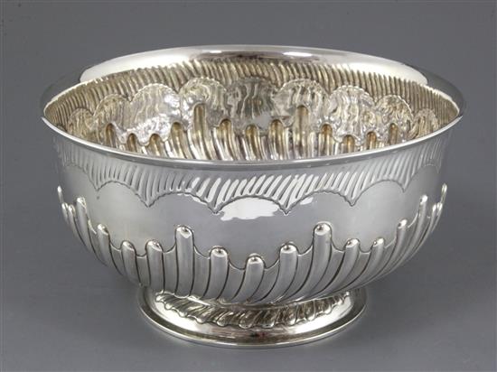 A late Victorian demi fluted silver punch bowl by Goldsmiths & Silversmiths Co, London, 1891, 22 oz.